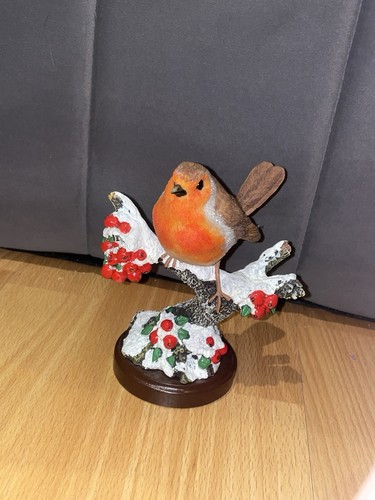 Robin branch ornament by - on, a