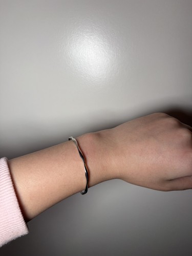 Silver tone twisted wave - tone,