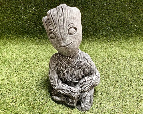 Concrete tree man groot - man,