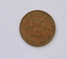 1869 brass quart pub token - 1869,