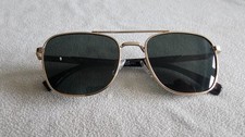 M&S gold / brown frame polarized sunglasses.