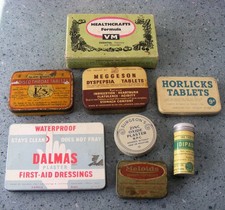 7 VINTAGE CHEMIST TINS AND 1 BOX