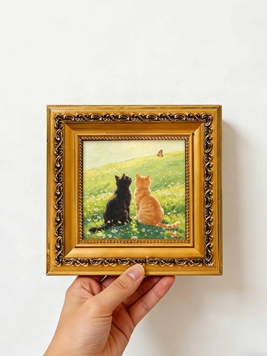 Two cats watching butterfly - two,