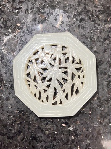 Hand carved jadeite pendant - hand,