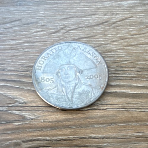Five pounds coin - five,