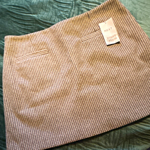 Next grey check - next,