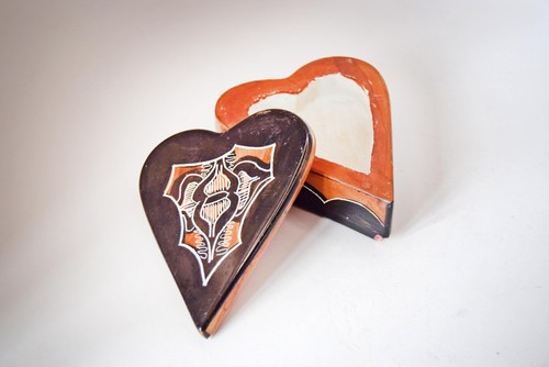 Hand carved and painted - hand,