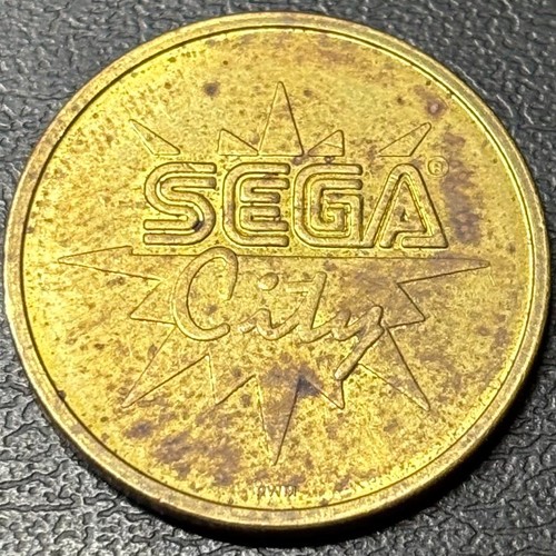 Sega city arcade game - game, token