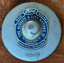 The ALDGATE & CITY MOTORS VINTAGE  BARNACLE CAR TAX DISC HOLDER