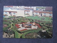 Vintage 1970s Postcard of Morecambe Bay Holiday Camp, Garden and De-Lux Chalets