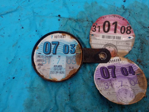 Old tax disks - holder, a