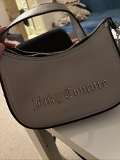 Handbag juicy couture new without tags comes with lovely charms 