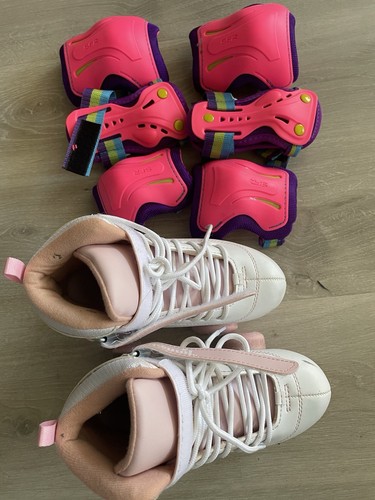 Used pink roller skates for - roller,