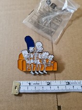 THE SIMPSONS FAMILY SITTING ON COUCH X-RAY SKELETONS ENAMEL & METAL PIN BADGE