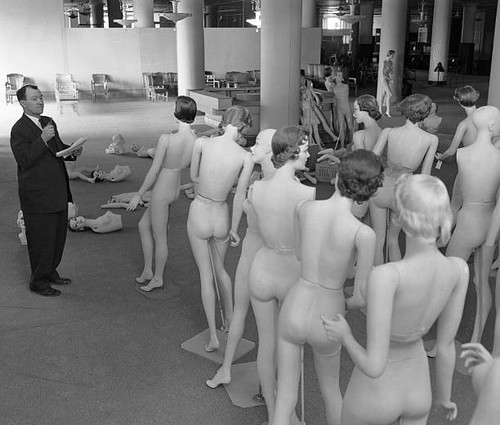 Man inspecting mannequins - mannequins, 1955