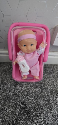 Cute baby doll complete with - , a