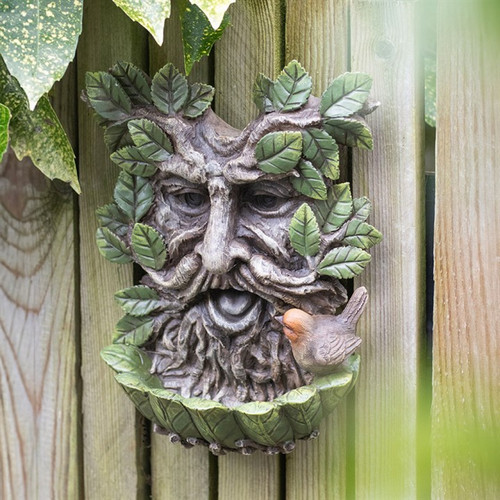 Green man bird bath wall - man,