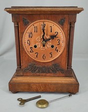 ARTS AND CRAFTS OPEN FACE STRIKING MANTEL CLOCK IN OAK CASE - LIBERTY ?