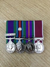 4 MINIATURE MEDALS COURT MOUNTED READY FOR WEAR