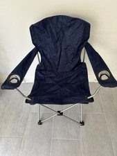 Folding Chair supported by 4 legs that collapse together for transport/storage