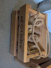 wooden lawn game called Mölkky, also known as Number Kubb .