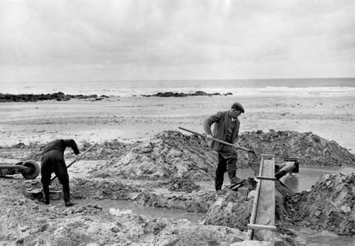Men panning for tin the - tin, on