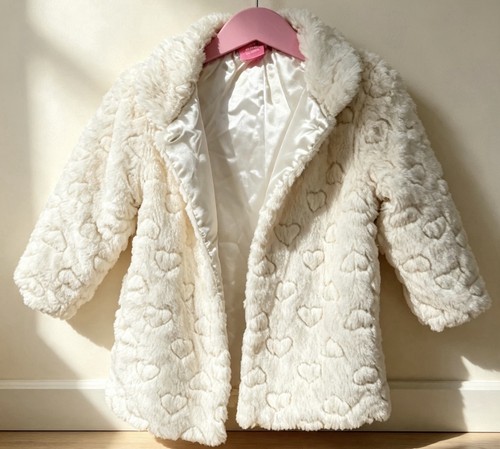 White fluffy coat with soft - white,