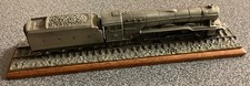 SOLID PEWTER,LNER 4472 MINIATURE LOCOMOTIVE TRAIN ON WOODEN PLINTH.16 x 4 cm