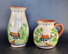 Pair hand painted pottery - of,