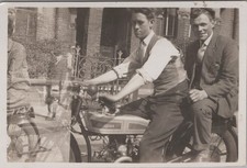 Men Riding Douglas Motorcycle
