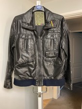 Gio-goi mens waterproof black heavyweight jacket with lots of pockets. 