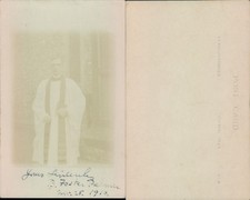 Clergyman standing outside