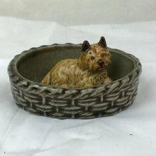 VINTAGE DOG IN A BASKET