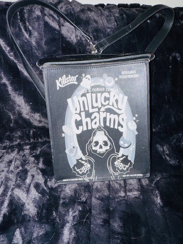 Unlucky charms dolls - charms”,