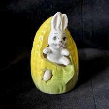 Vintage ceramic rabbit in corn