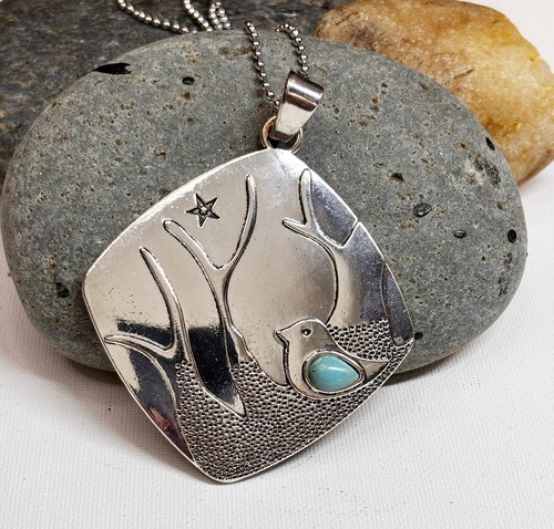 Silver tone bird charm - tone,