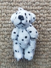Tiny Jointed White Polka Dots