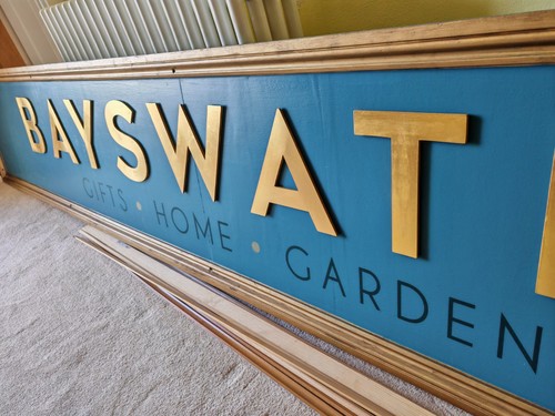 Wooden shop front - shop, sign
