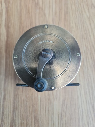 Antique brass trout - fly, reel