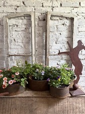 A Set Of Four Galvanised