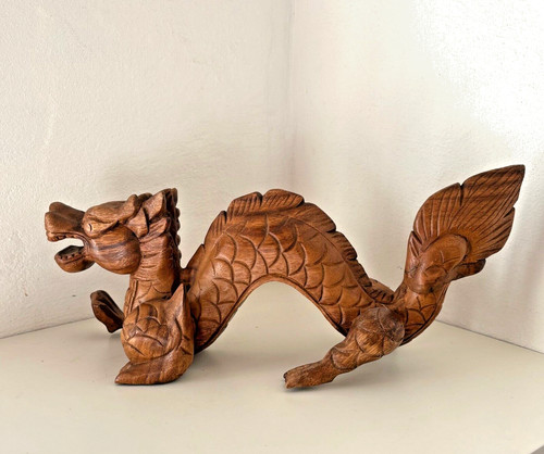 Hand carved wooden dragon - hand,