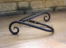 A PAIR BLACKSMITH WROUGHT IRON