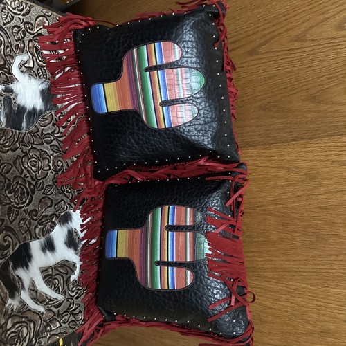 Hand crafted leather - hand, pillows