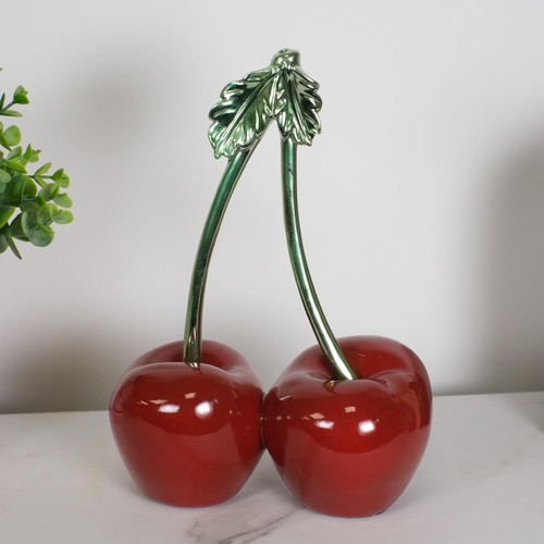 Red and metallic green joined - and,