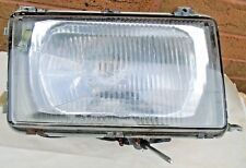 volvo 343 drivers side HEADLAMP complete with wiper motor made by Hella