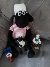 Shaun the sheep plush/soft toy and mobile phone holder and two figures.