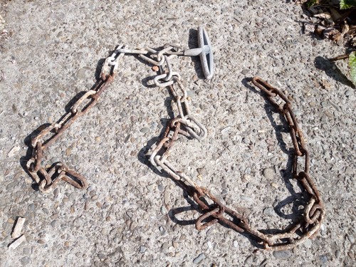 Old rusty chain meter - chain,