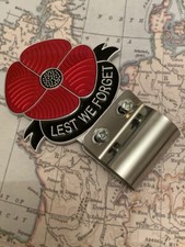 Red poppy car badge with - red,