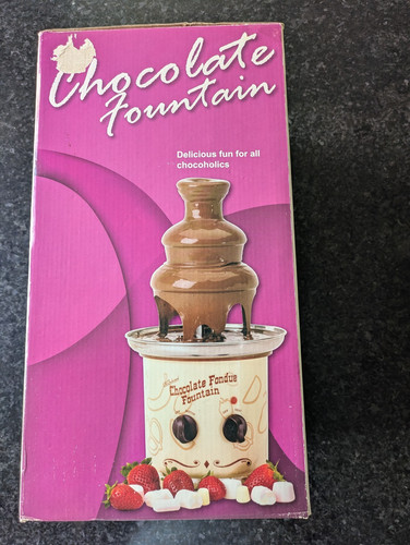 Chocolate fountain machine - chocolate,