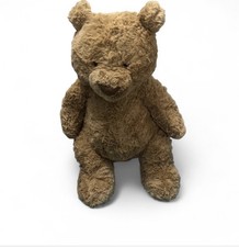 Brown teddy bear with a cute